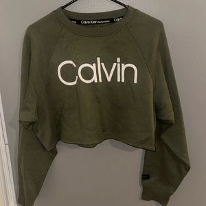 Army green cropped Calvin Klein long sleeve in size large.